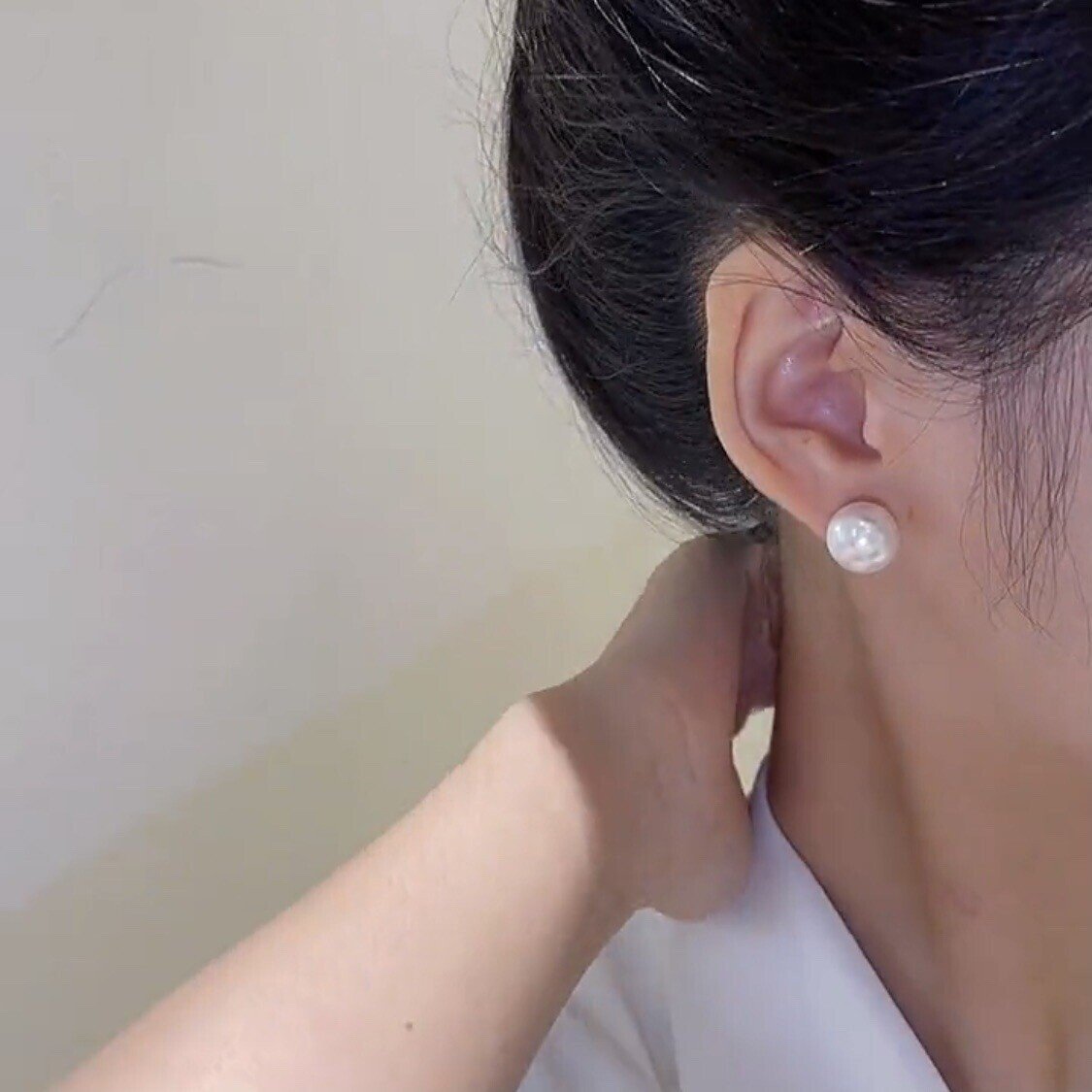 Pearl earrings (various wearing styles)