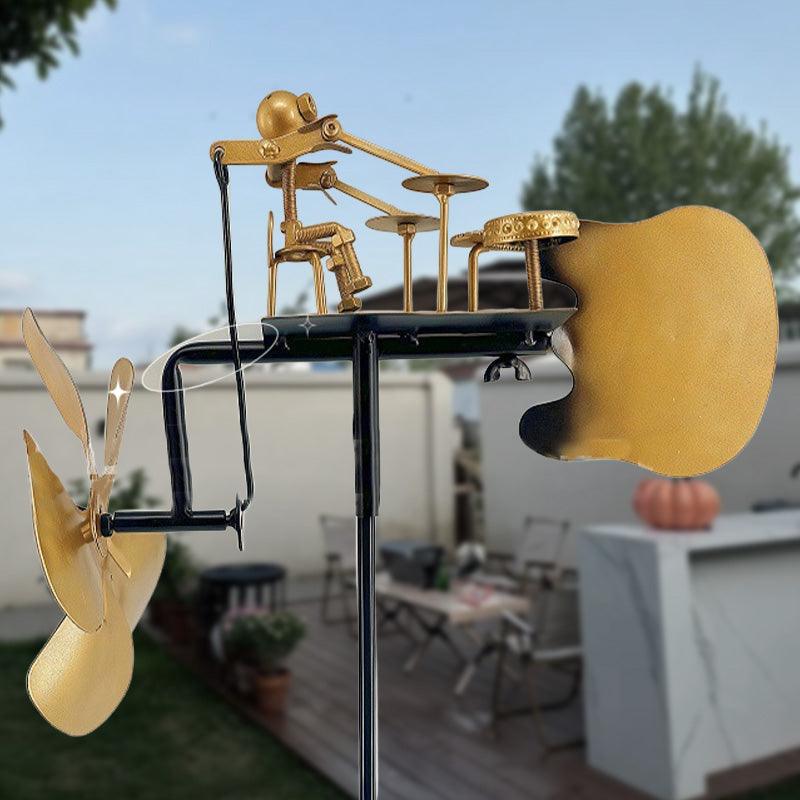 Handmade metal windmill, decoration with ground plug