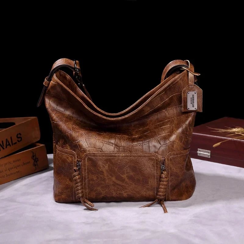 Vintage brand style single shoulder cross-arm capacity women's bag